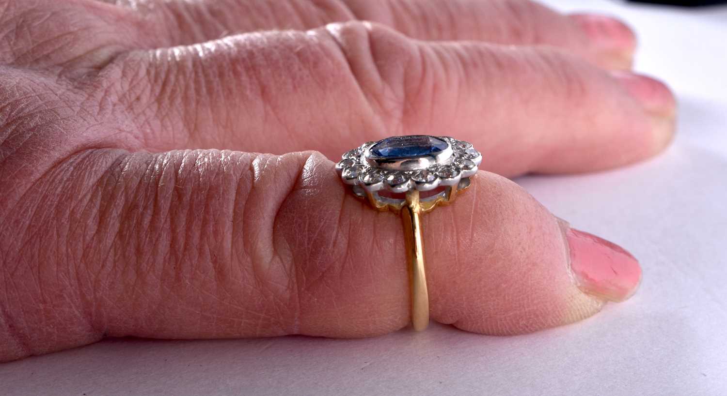 AN EDWARDIAN 18CT GOLD DIAMOND AND PALE SAPPHIRE RING. K. 4.6 grams. - Image 6 of 8