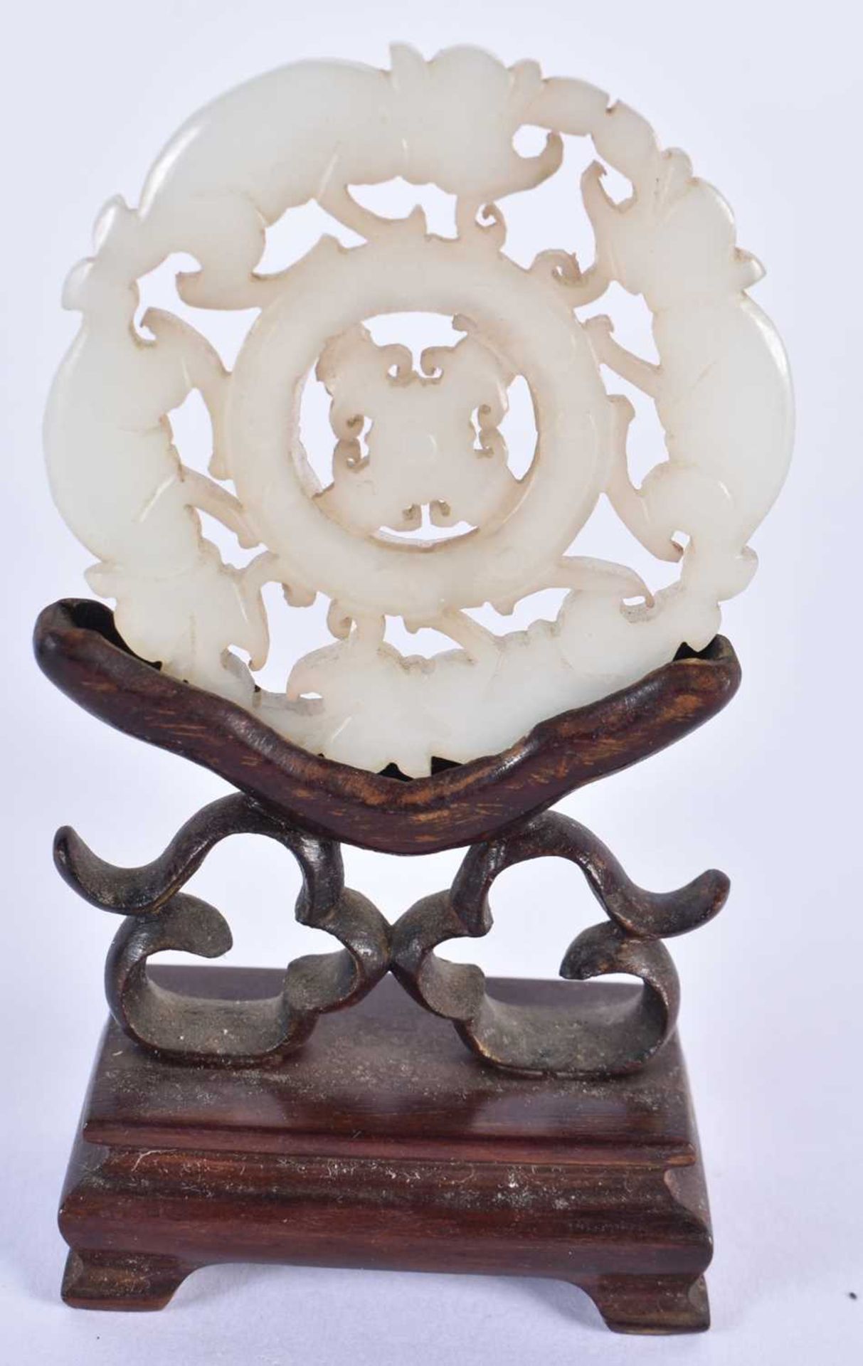 THREE 19TH CENTURY CHINESE GREEN JADE ROUNDELS Qing, in various forms. Jade 5 cm wide. (3) - Image 4 of 14