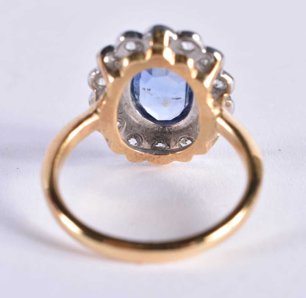 AN EDWARDIAN 18CT GOLD DIAMOND AND PALE SAPPHIRE RING. K. 4.6 grams. - Image 3 of 8