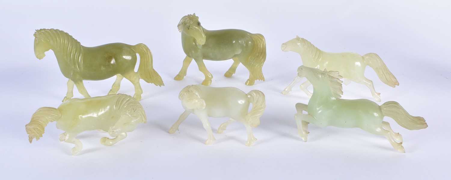 A SET OF SIX LATE 19TH CENTURY CHINESE CARVED JADE HORSES Late Qing, modelled in various forms and