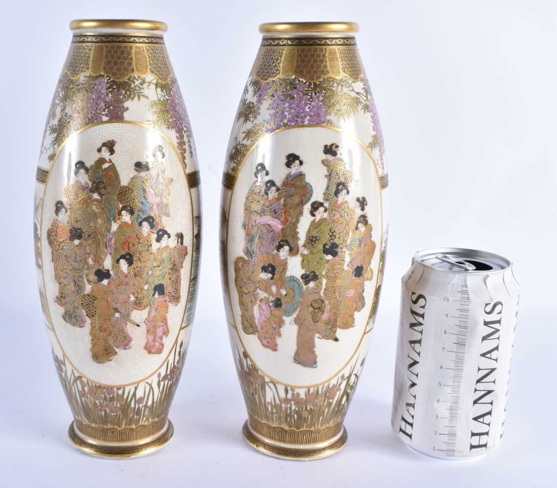 A PAIR OF LATE 19TH CENTURY JAPANESE MEIJI PERIOD SATSUMA POTTERY VASES painted with a group of