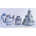 AN ANTIQUE DELFT FAIENCE WALL BRACKET together with a Delft figural monkey jug & a similar tea