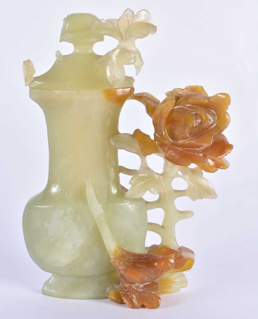 AN EARLY 20TH CENTURY CHINESE FLATTENED JADE VASE AND COVER Late Qing/Republic, formed with overlaid