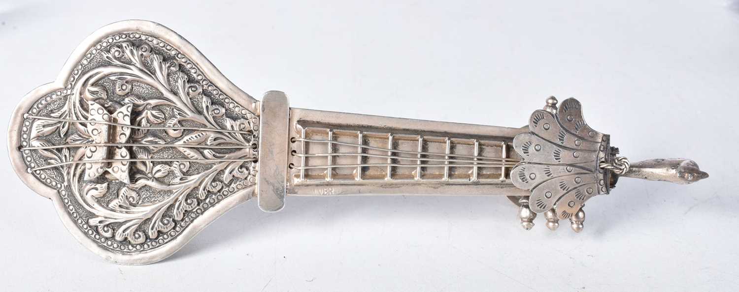 An Indian Silver Opium Pipe Box in the form of a Veena with a Peacock Yalt above the Kunti. - Image 2 of 3