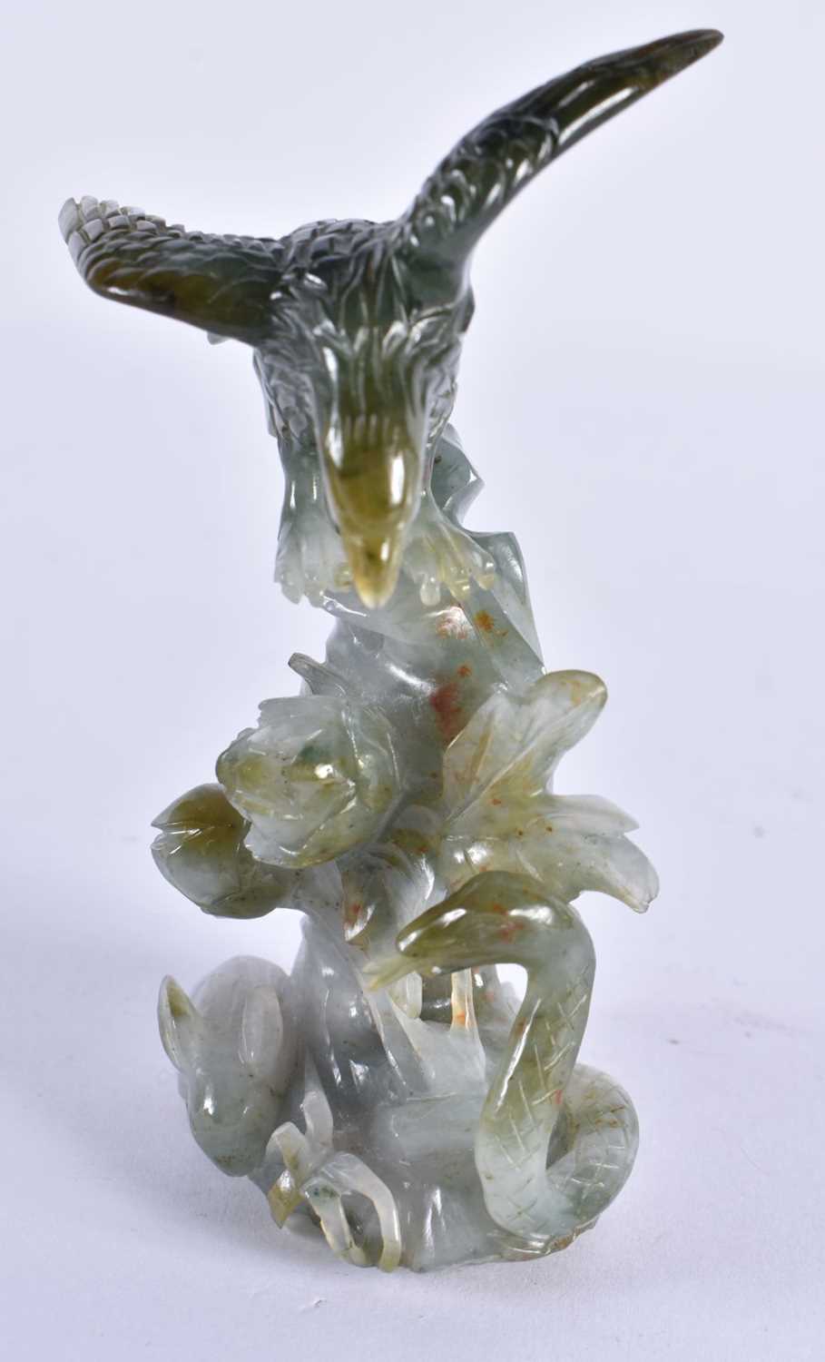 AN EARLY 20TH CENTURY CHINESE CARVED JADEITE FIGURE OF AN EAGLE Late Qing/Republic. 12 cm x 6 cm. - Image 2 of 6