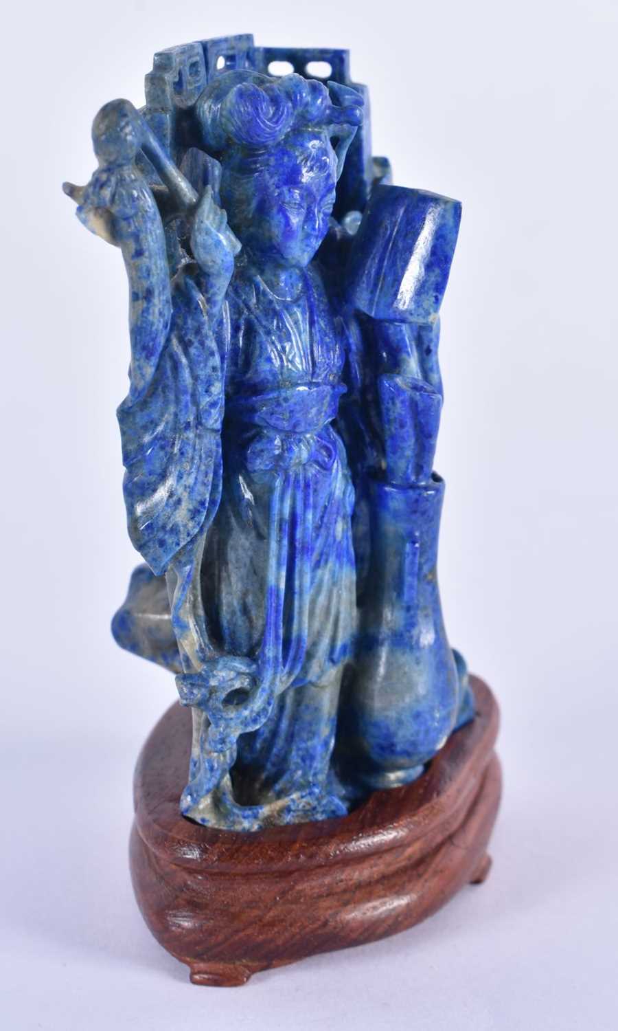 A LATE 19TH CENTURY CHINESE CARVED LAPIS LAZULI FIGURE OF A FEMALE Late Qing, modelled standing - Image 4 of 5