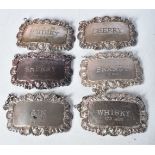 Six Silver Decanter Labels.. Hallmarked Birmingham and London between 1975 and 1982, 6cm x 4cn,