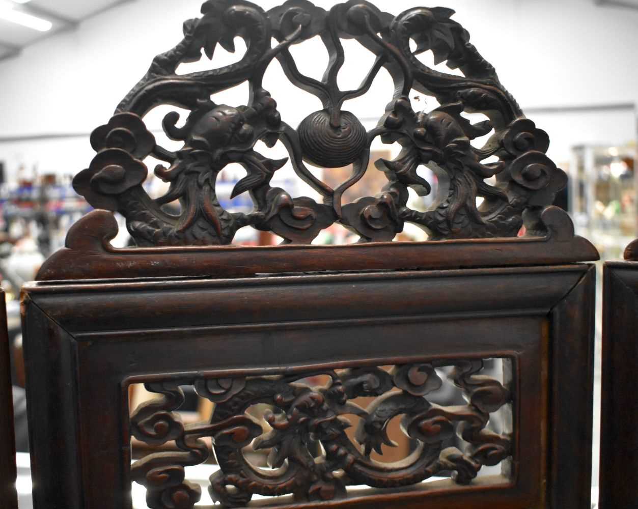 A LARGE 19TH CENTURY CHINESE CARVED HARDWOOD FOUR FOLD DRAGON SCREEN Qing. 142 cm x 136 cm. - Image 3 of 13