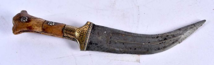 A rare small child dagger with carved blade , gold inlay knob and walrus hilt. The size surely