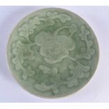 A 17TH/18TH CENTURY CHINESE LONGQUAN CELADON MOULDED DISH Late Ming. 14.5 cm diameter.