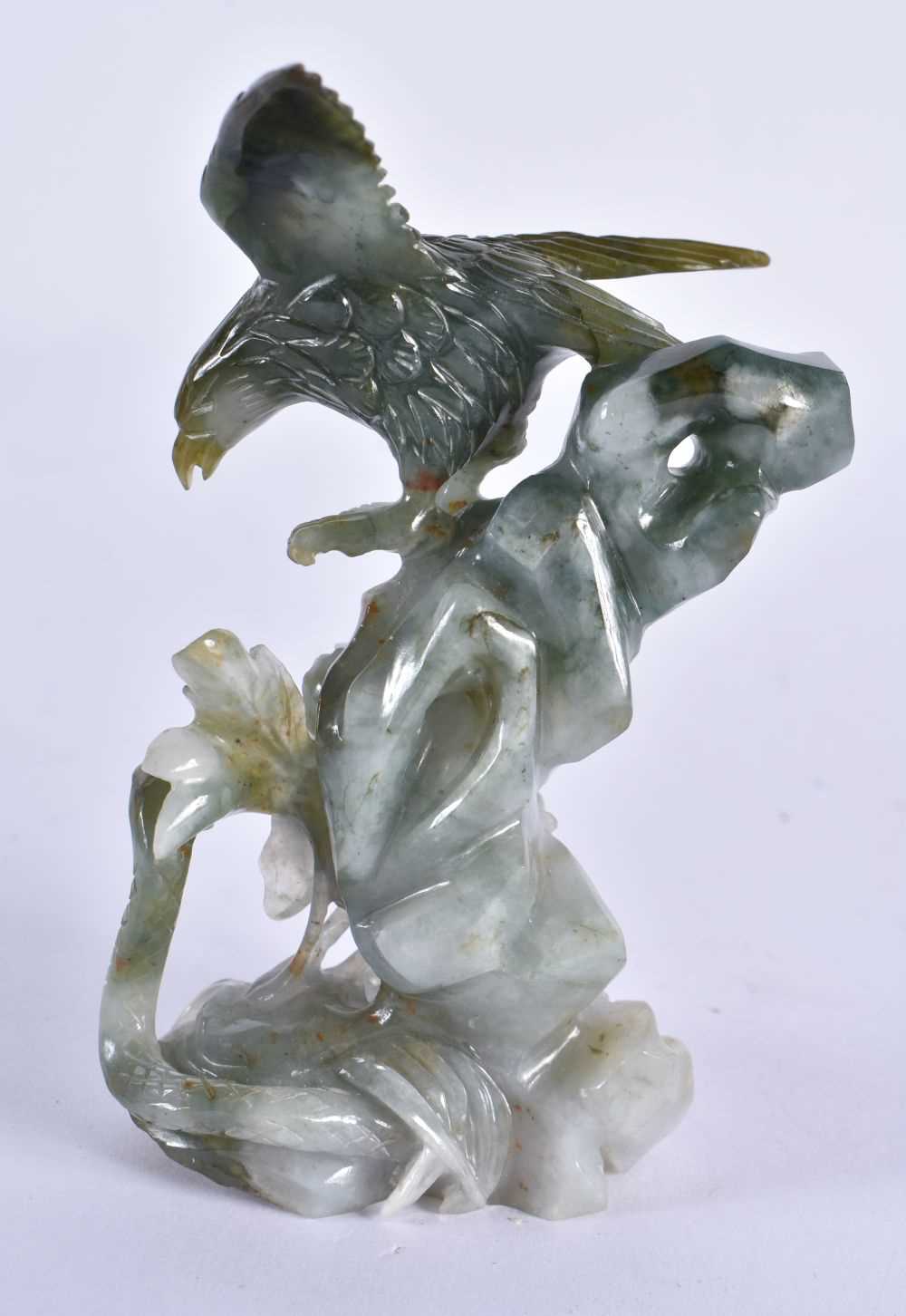 AN EARLY 20TH CENTURY CHINESE CARVED JADEITE FIGURE OF AN EAGLE Late Qing/Republic. 12 cm x 6 cm. - Image 3 of 6