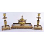A FINE 19TH CENTURY FRENCH BRONZE AND CHAMPLEVE ENAMEL DESK GARNITURE in the manner of