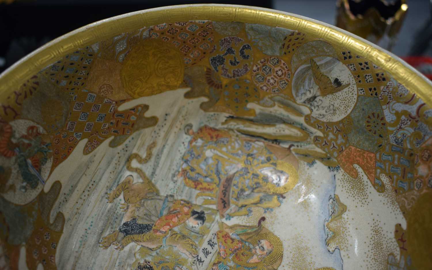 A LARGE 19TH CENTURY JAPANESE MEIJI PERIOD SATSUMA BOWL painted with immortals within landscapes, - Image 16 of 18