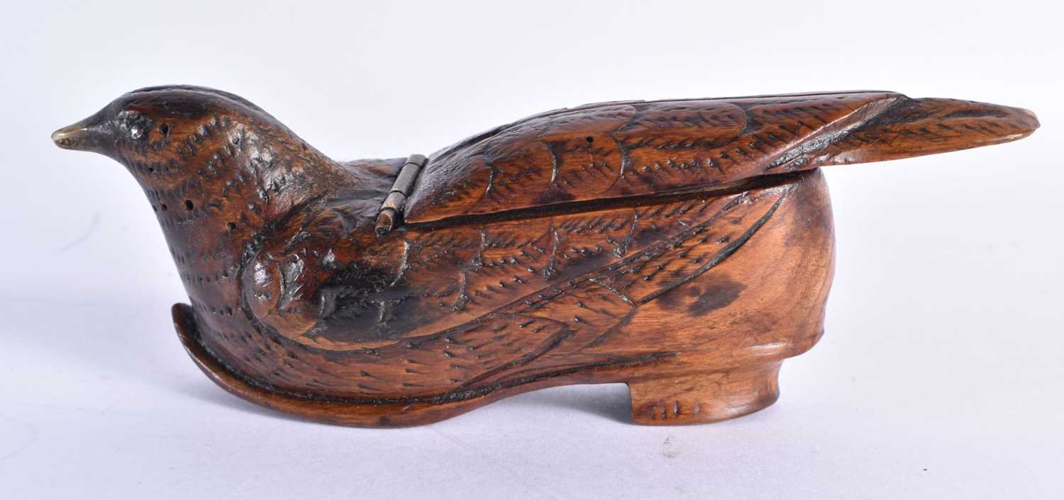 A RARE 18TH CENTURY CARVED TREEN SNUFF BOX formed unusually as a bird seated within a shoe. 13 cm