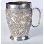 A White Metal Cup with Embossed Floral decoration. 8.3cm x 8.4cm x 6.4cm, weight 121g