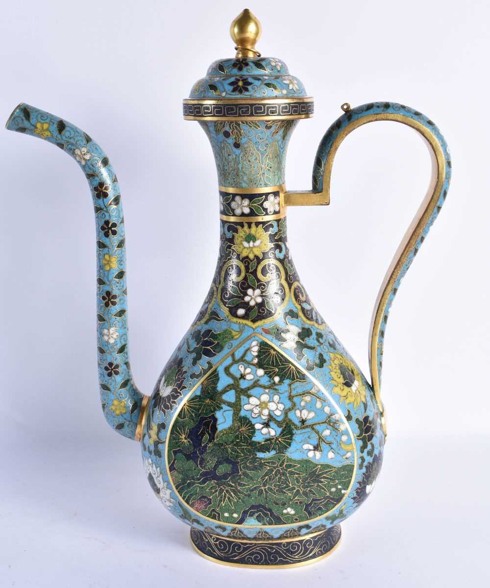 A FINE AND RARE CHINESE CLOISONNE ENAMEL EWER AND COVER probably Ming, decorated with shaped