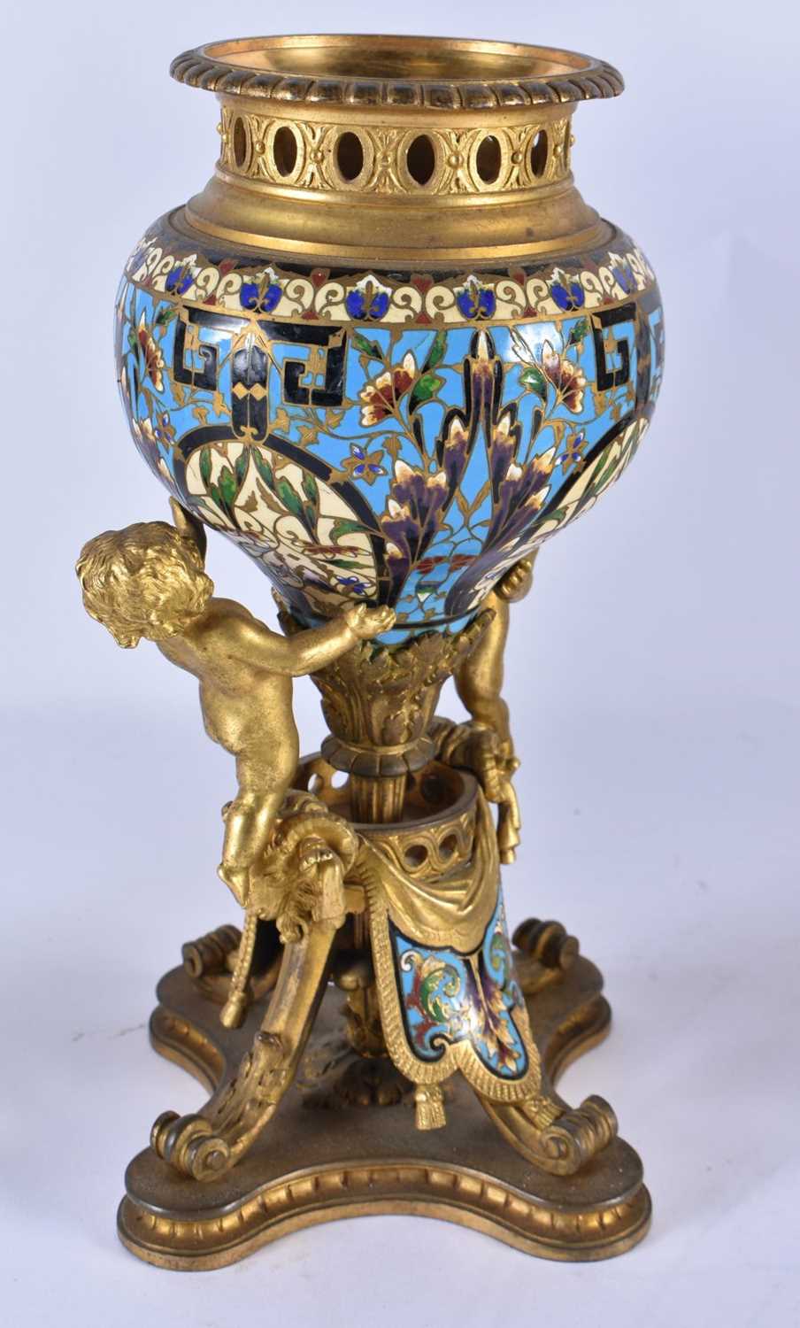 A FINE 19TH CENTURY FRENCH ORMOLU AND CHAMPLEVE ENAMEL CLOCK GARNITURE formed with putti amongst - Image 5 of 9