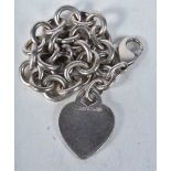 Silver bracelet with heart tag by designer Tiffany & Co. Stamped Tiffany 925. 19cm long, weight 35g
