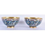 A FINE PAIR OF CLOISONNE ENAMEL BRONZE BOWLS Jiajing mark and probably of the period, decorated on a