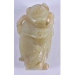 A SMALLER 19TH CENTURY CHINESE CARVED GREEN JADE FIGURE OF A BOY Qing. 4.5 cm x 2 cm.