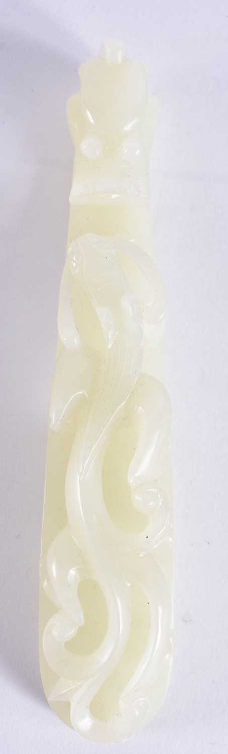 A FINE PAIR OF CHINESE QING DYNASTY CARVED GREENISH WHITE JADE BELT HOOKS Qing, formed as stylised - Image 5 of 30