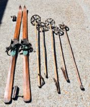A Pair of 1920's Vintage Lily Whites ski's together with five Bamboo ski poles, 192x 10cm (7)