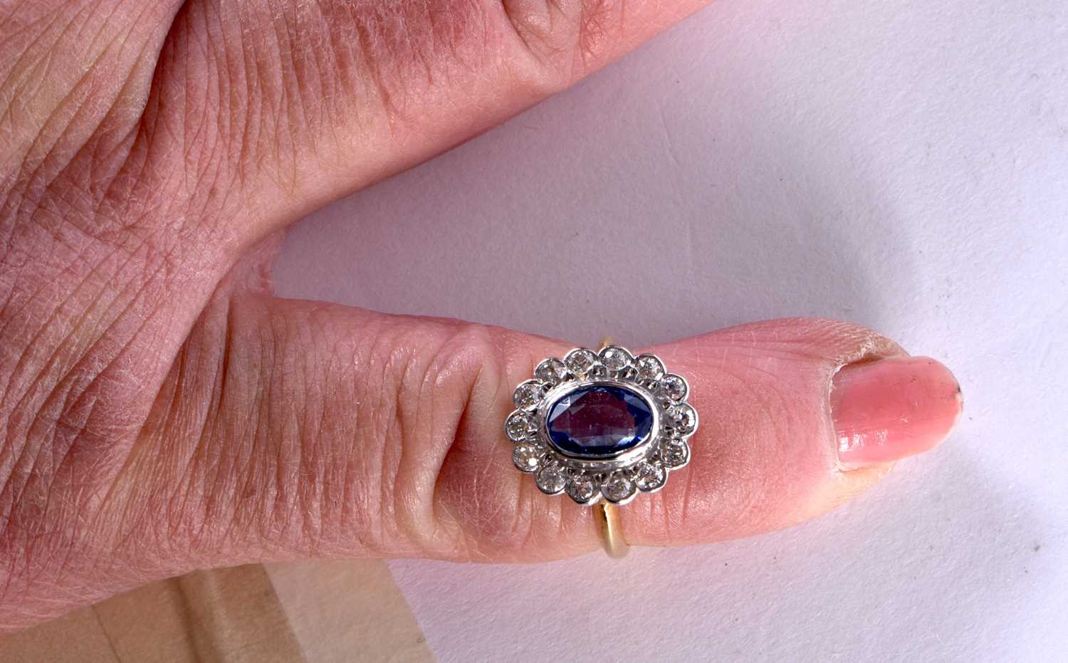 AN EDWARDIAN 18CT GOLD DIAMOND AND PALE SAPPHIRE RING. K. 4.6 grams. - Image 5 of 8