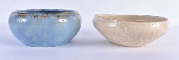 AN EARLY CHINESE PALE CELADON TYPE BOWL together with a junyao bowl. 16 cm diameter. (2)