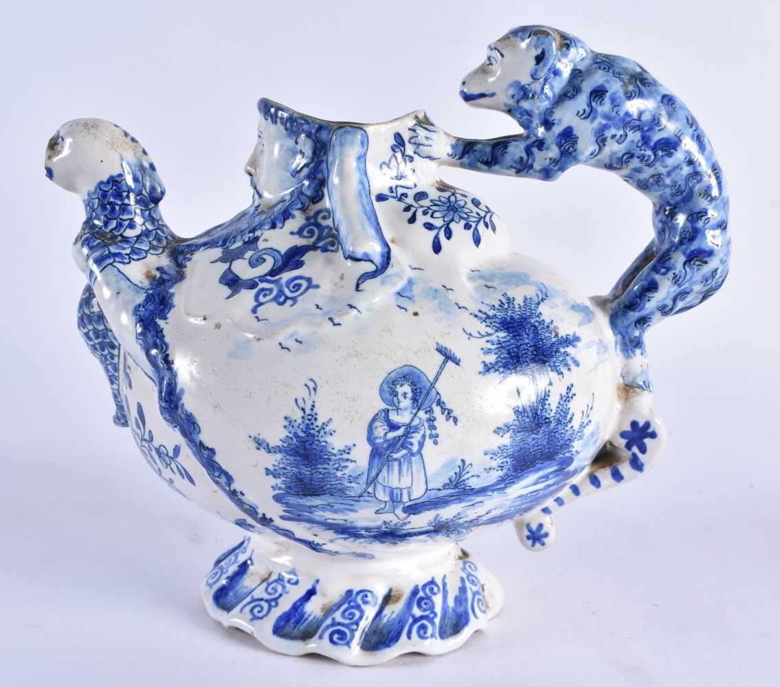 AN ANTIQUE DELFT FAIENCE WALL BRACKET together with a Delft figural monkey jug & a similar tea - Image 2 of 12