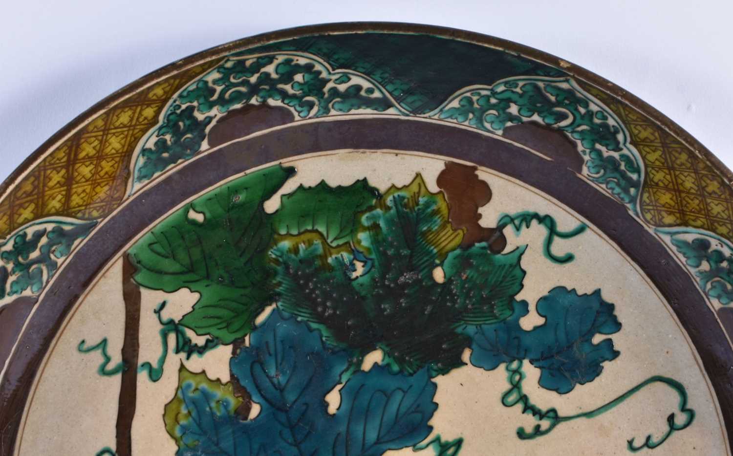 A LARGE 18TH CENTURY JAPANESE EDO PERIOD AO KUTANI DISH painted with flowers and landscapes. 37 cm - Image 2 of 6