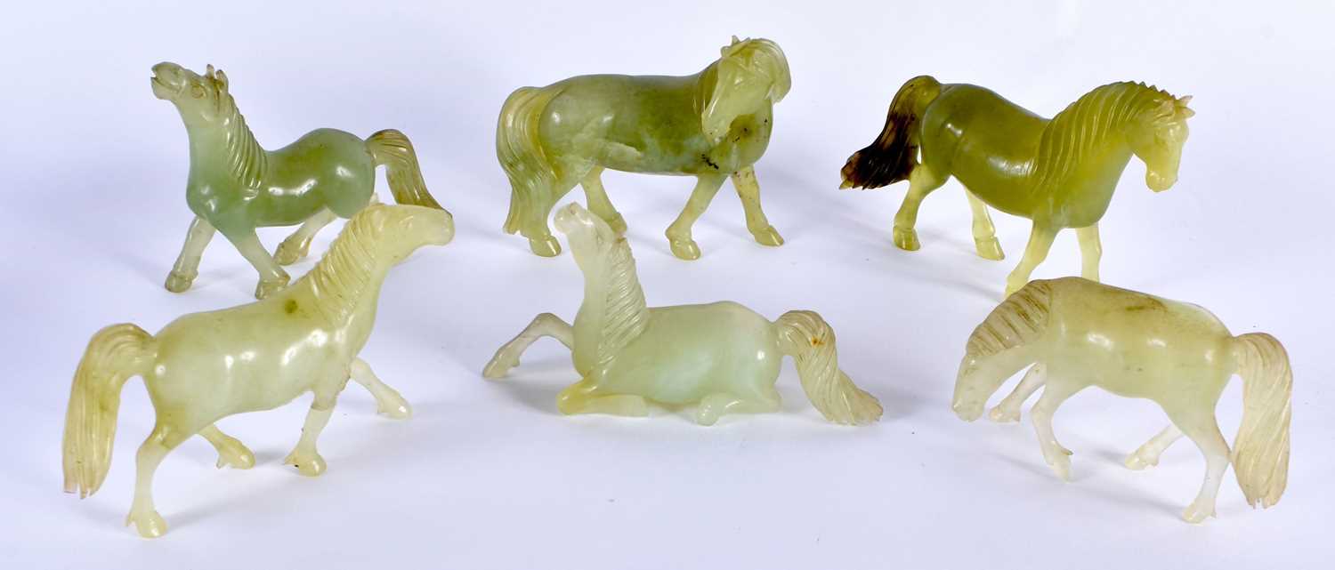 A SET OF SIX LATE 19TH CENTURY CHINESE CARVED JADE HORSES Late Qing, modelled in various forms and