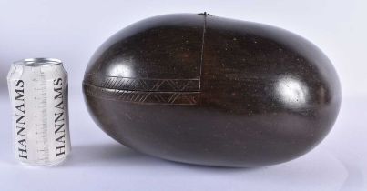 A LARGE 19TH CENTURY COCO DE MER COUNTRY HOUSE NUT CASKET AND COVER of naturalistic form. 28 cm x 28