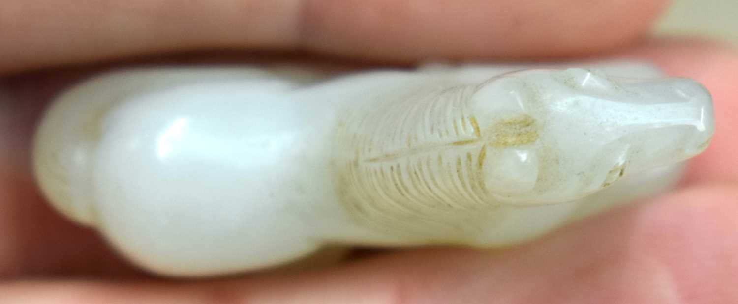 A 19TH CENTURY CHINESE CARVED WHITE JADE FIGURE OF A RECUMBANT HORSE Qing. 3 cm x 2 cm. - Image 12 of 12