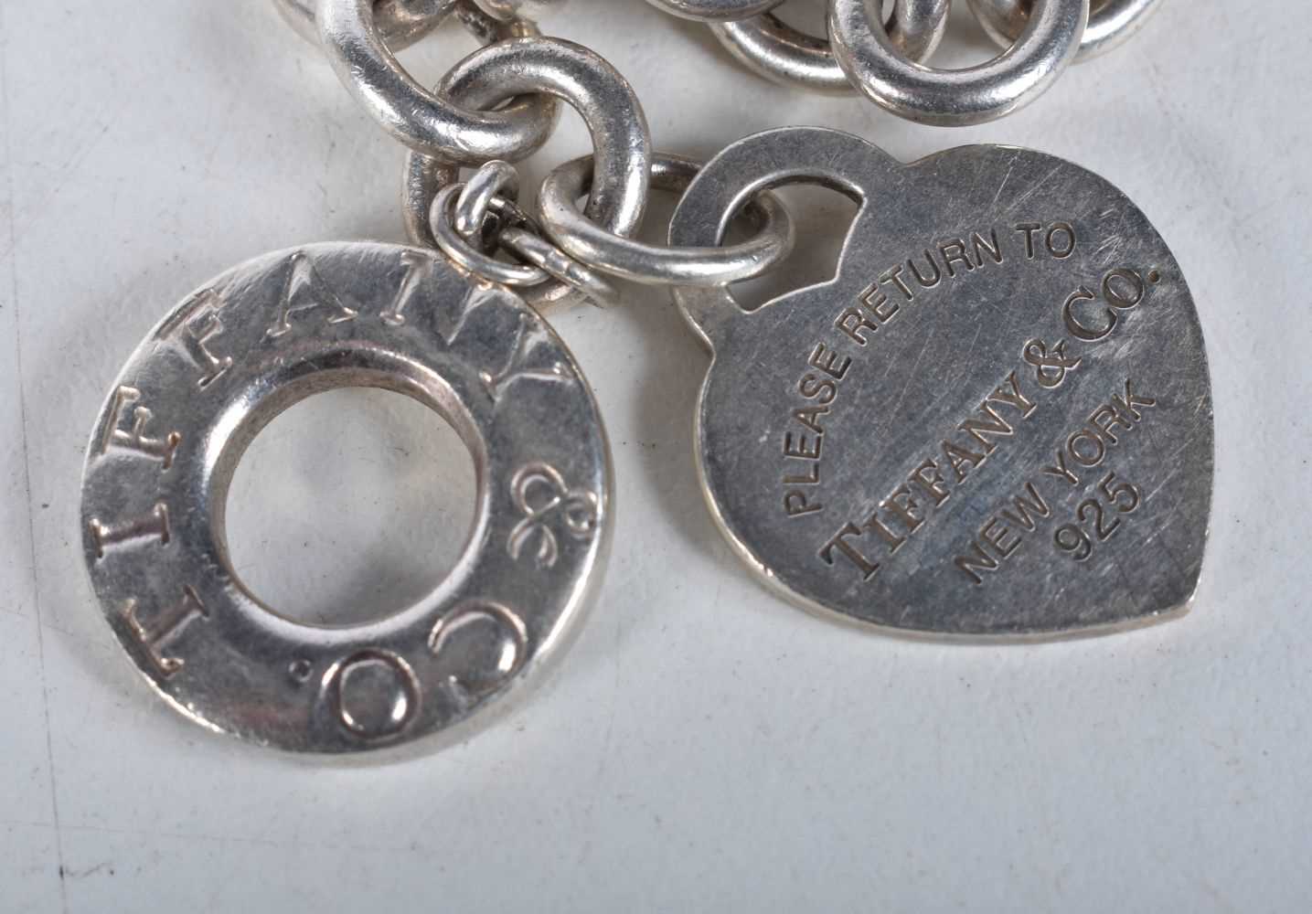 A Tiffany Silver Bracelet with Heart Tag. Stamped Tiffany 925, length 19cm, weight 41g - Image 2 of 3