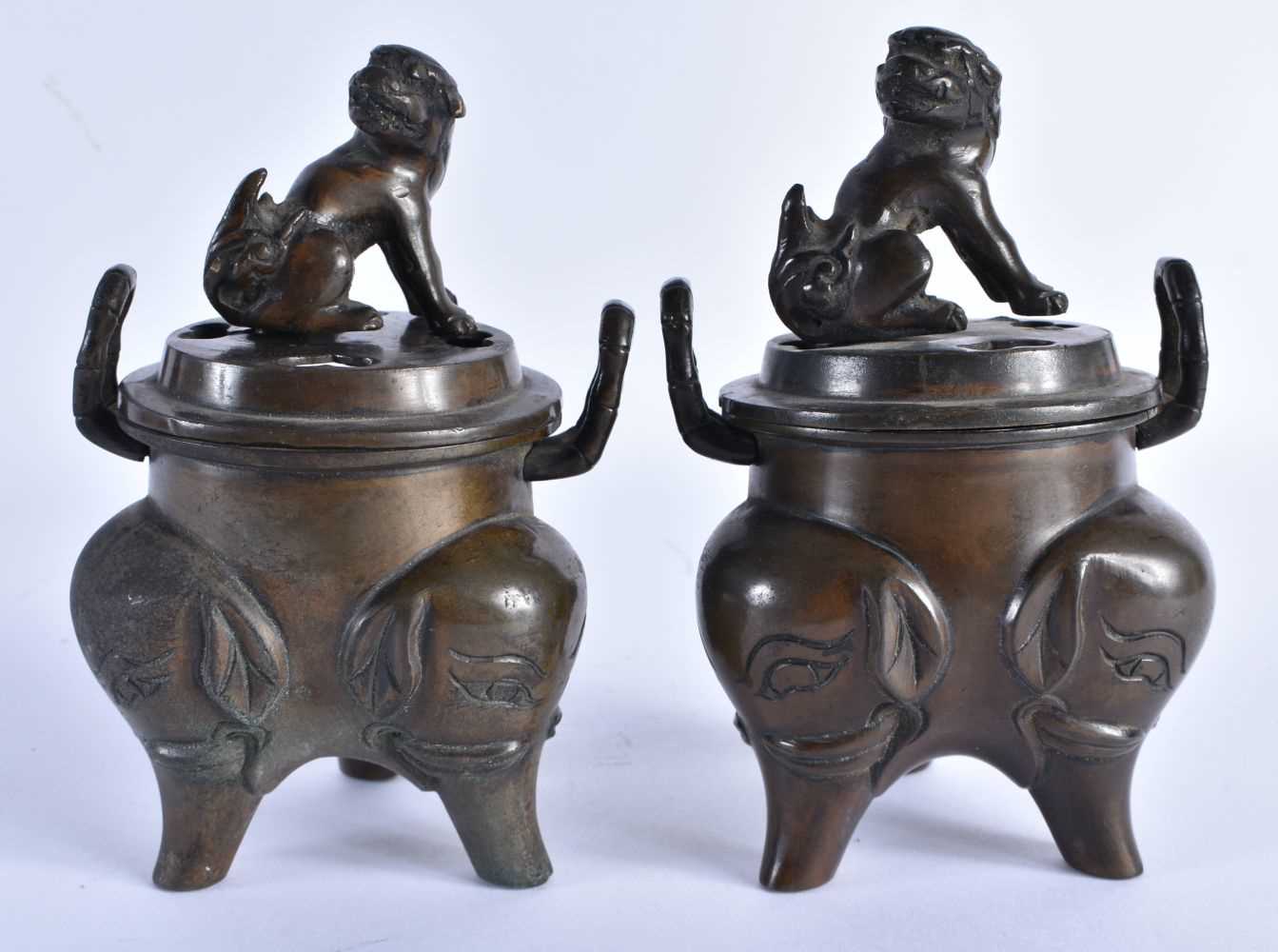 A PAIR OF LATE 19TH/20TH CENTURY JAPANESE MEIJI PERIOD BRONZE CENSERS AND COVERS formed with