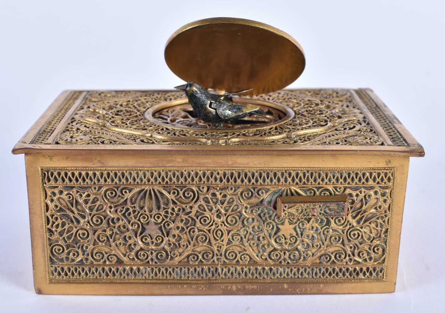 AN ANTIQUE SWISS BRONZE AUTOMATON SINGING BIRD BOX decorated with filigree foliage and vines. 10 - Image 2 of 5