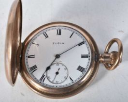 An Elgin Pocket Watch with White Enamel Dial and Black Roman Numerals. 5cm diameter, working