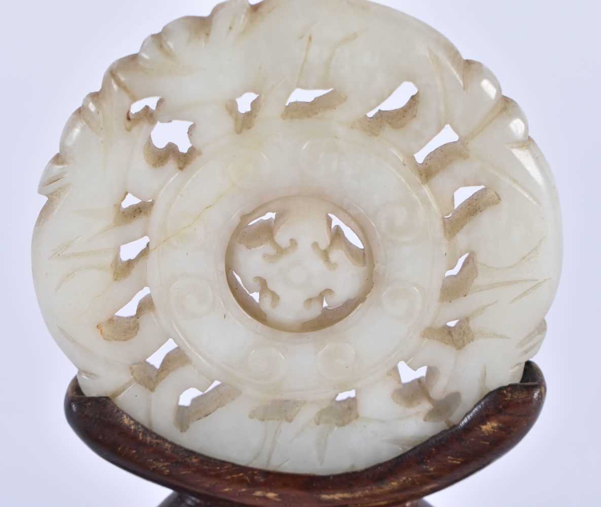 THREE 19TH CENTURY CHINESE CARVED JADE ROUNDELS Qing, in various designs and sizes. Largest 6.25 - Image 2 of 13