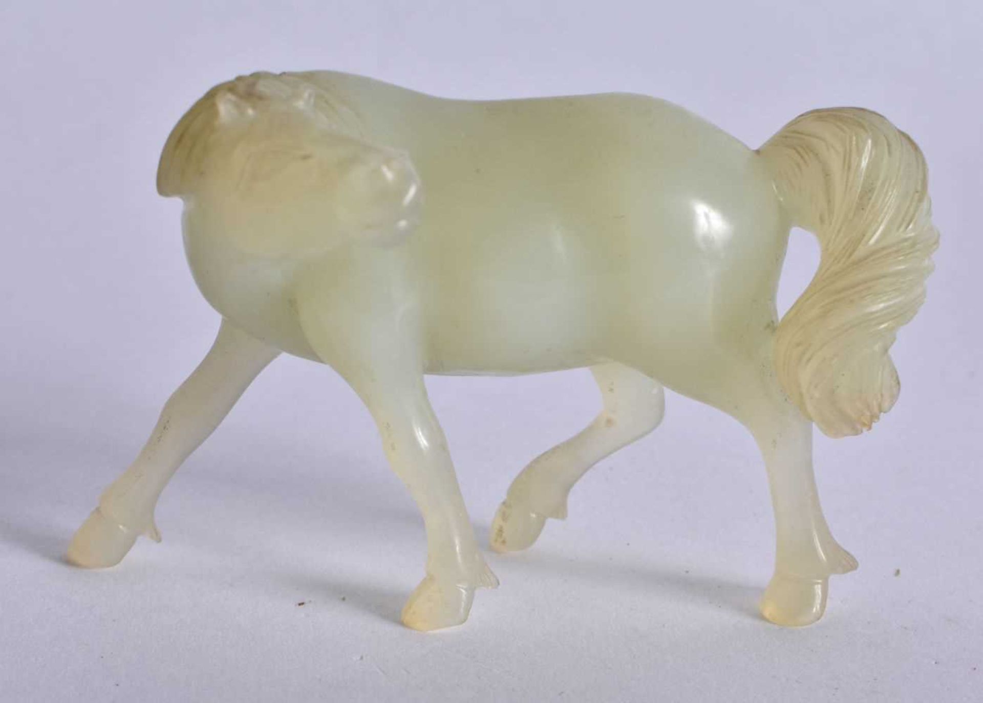 A SET OF SIX LATE 19TH CENTURY CHINESE CARVED JADE HORSES Late Qing, modelled in various forms and - Image 6 of 13