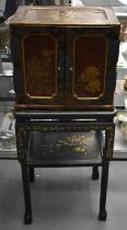 A VERY FINE 18TH/19TH CENTURY JAPANESE EDO PERIOD LACQUERED TABLE CABINET by Tsurushita Chouji, upon