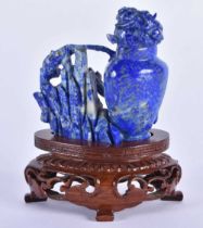 A 19TH CENTURY CHINSE CARVED LAPIS LAZULI VASE AND COVER Qing, overlaid with chilong beasts and