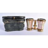 A CASED PAIR OF MOTHER OF PEARL OPERA GLASSES 9.5 11cm extended