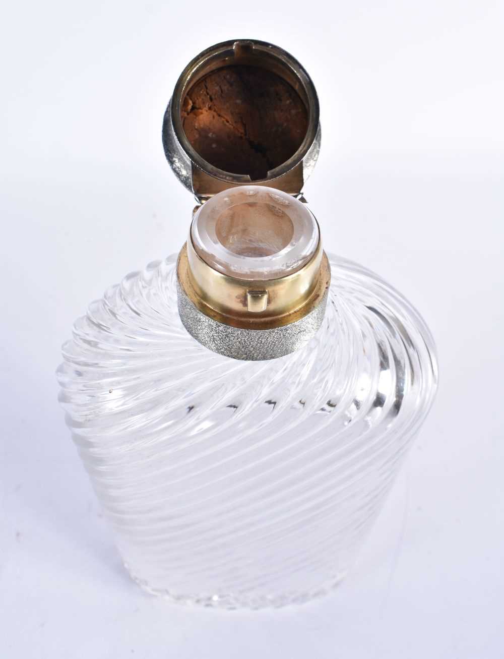 AN UNUSUALLY LARGE VICTORIAN SILVER MOUNTED WRYTHEN MOULDED GLASS BOTTLE by Thomas Johnson I, the - Image 3 of 6