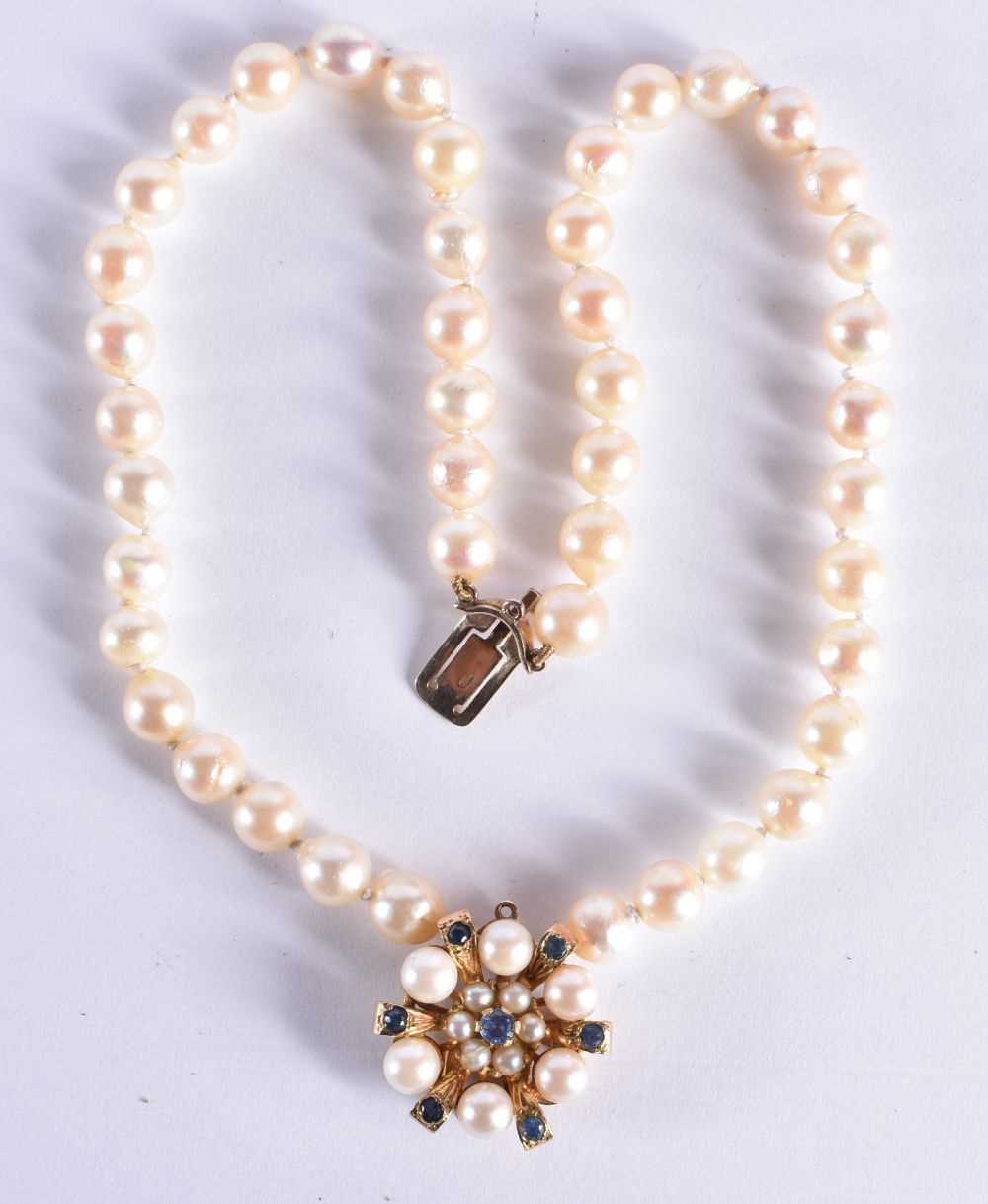 AN EDWARDIAN 9CT GOLD AND PEARL NECKLACE. 25 grams. 19 cm long.
