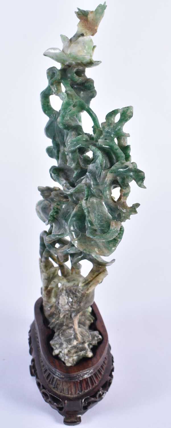 A LARGE EARLY 20TH CENTURY CHINESE CARVED TRI COLOUR JADEITE FIGURE OF AN IMMORTAL Late Qing/ - Image 3 of 6