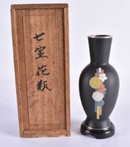 A JAPANESE TAISHO PERIOD CLOISONNE ENAMEL MATT BLACK SILVER VASE decorated with an elegant floral