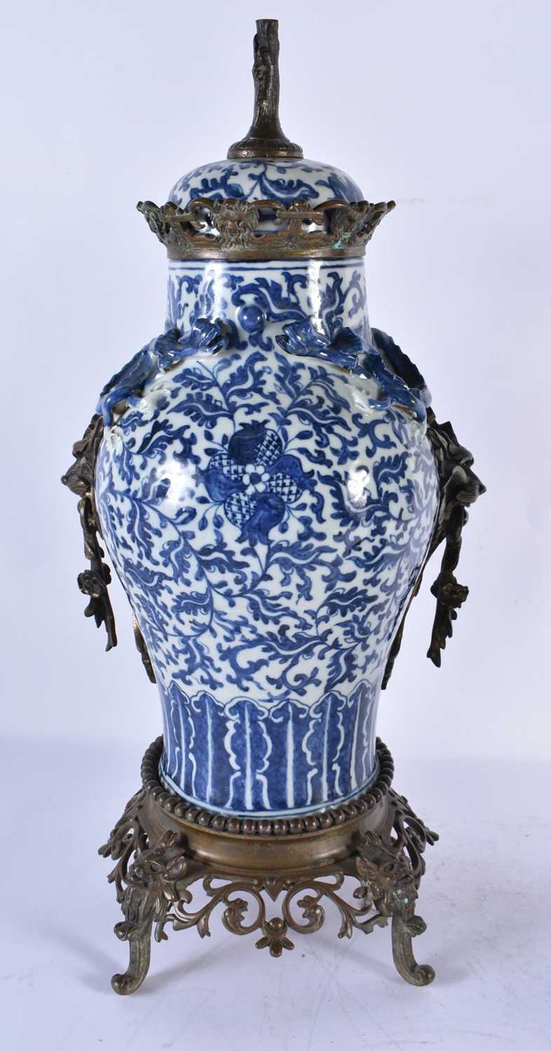 A LARGE PAIR OF 19TH CENTURY CHINESE BLUE AND WHITE BRONZE MOUNTED VASES Qing. 48 cm high. - Image 4 of 24