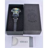 A VERSACE ROSENTHAL IRIDESCENT GLASS BOTTLE STOPPER. 14 cm long.