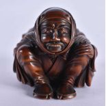 A FINE 19TH CENTURY JAPANESE CARVED BOXWOOD NETSUKE OF A SEATED MALE wonderfully carved squatting