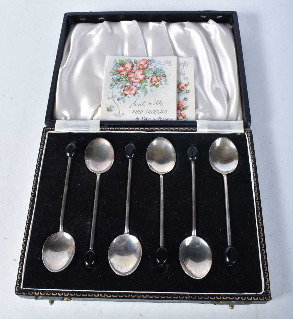 A Cased set of Six Silver and Guilloche Enamel "Coffee Bean" Spoons. Hallmarked Birmingham 1953, 9.